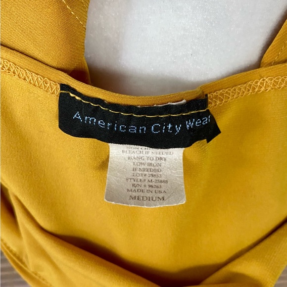 Darling gold blouse with draped neckline - Picture 5 of 10